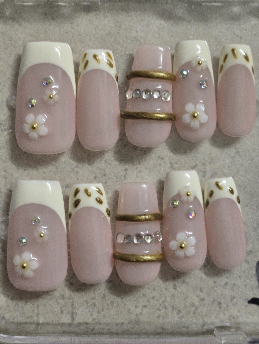 Elegant Pink French Tip Press-On Nails with Gold Accents, Medium Length Square